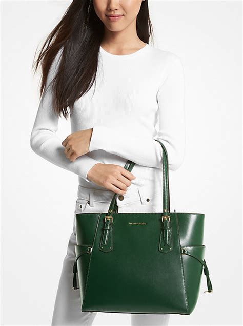 michael kors patent leather tote|Voyager Small Embossed Patent Leather and Logo Tote Bag.